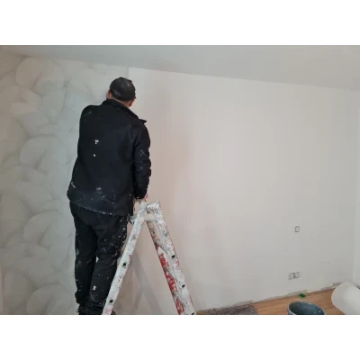 Pose de tapisserie